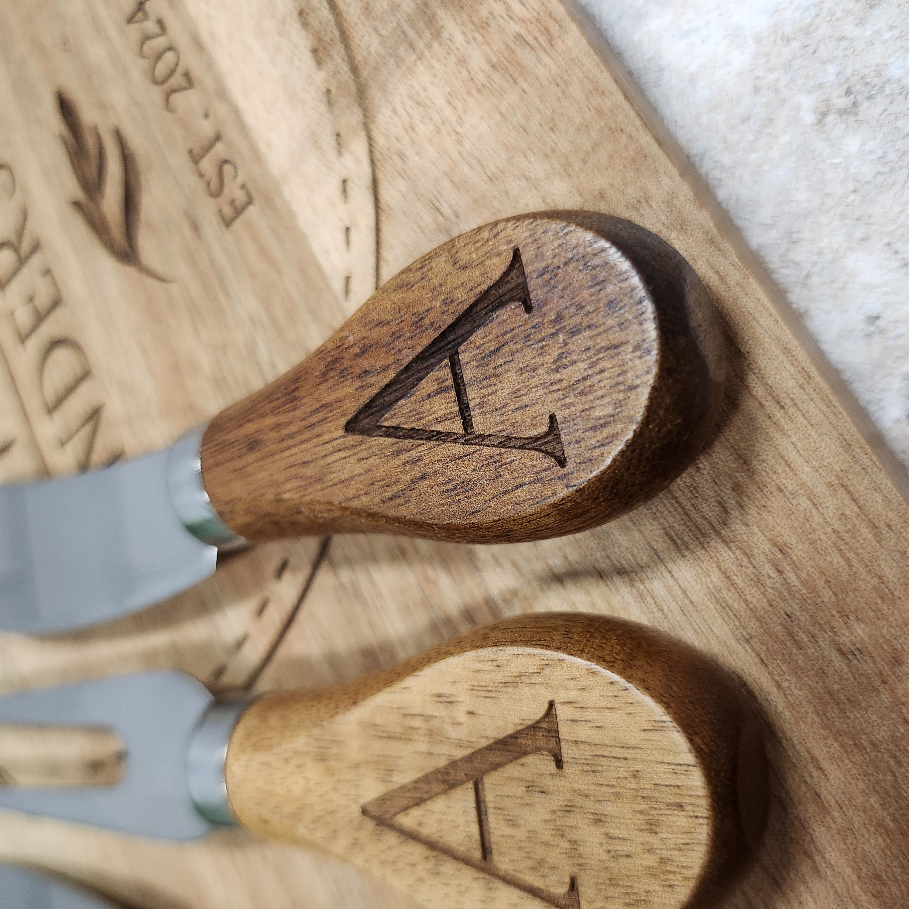 Close-up of engraved wood utensils