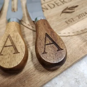 Close-up of engraved wood utensils