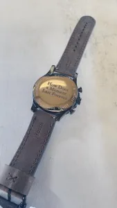 Engraved watch